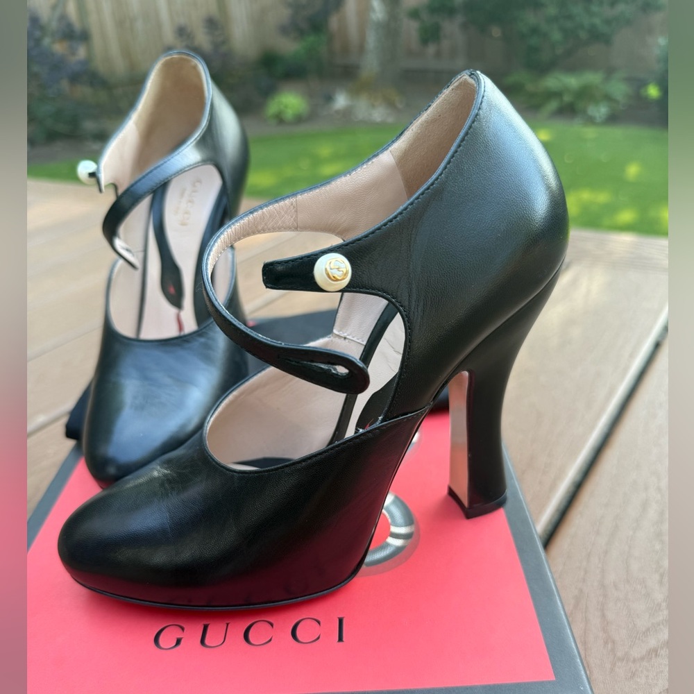 Gucci Black Heels with Gold Logo Faux Pearl Button Detail | Lesley